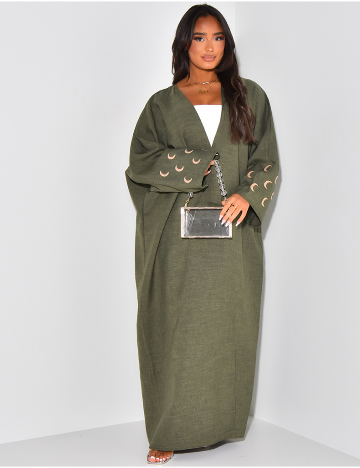 Kimono in Leinenoptik mit gestickten Mondmotiven auf den Ärmeln. Kimono in Leinenoptik mit gestickten Mondmotiven auf den Ärmeln.