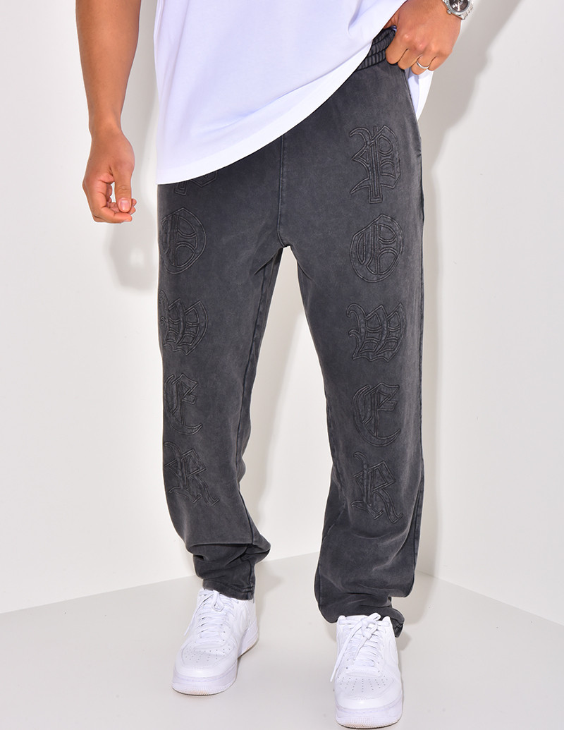 Pantalon de jogging à écriture aspect vieilli