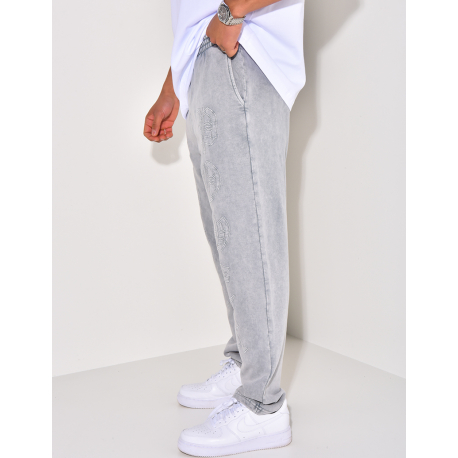 Pantalon de jogging à écriture aspect vieilli Pantalon de jogging à écriture aspect vieilli