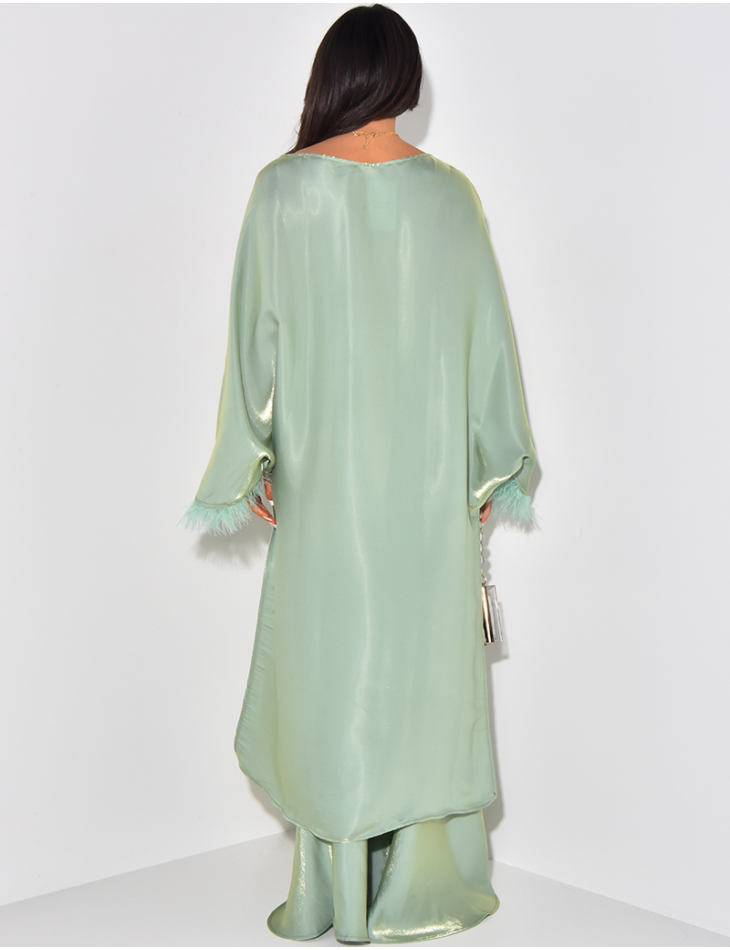 Asymmetrical feathered tunic and iridescent skirt set Asymmetrical feathered tunic and iridescent skirt set