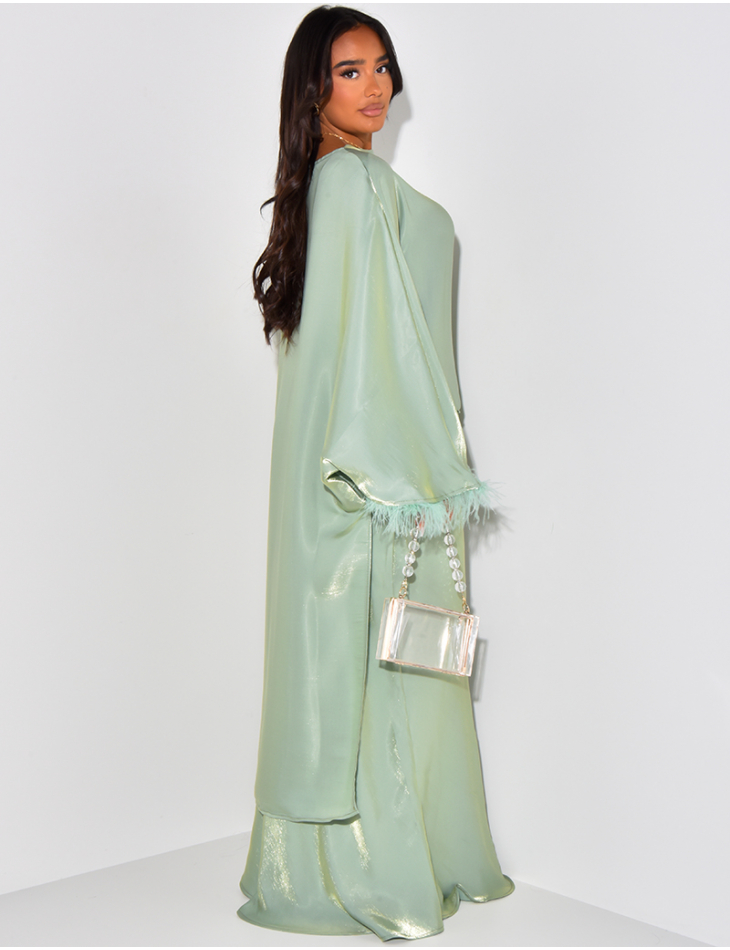 Asymmetrical feathered tunic and iridescent skirt set Asymmetrical feathered tunic and iridescent skirt set