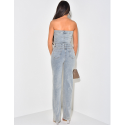 Bustierförmiger Jumpsuit aus Jeans mit Vintage-Waschung. Bustierförmiger Jumpsuit aus Jeans mit Vintage-Waschung.