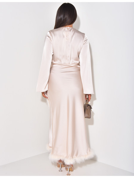 Long satin dress with feathered trims