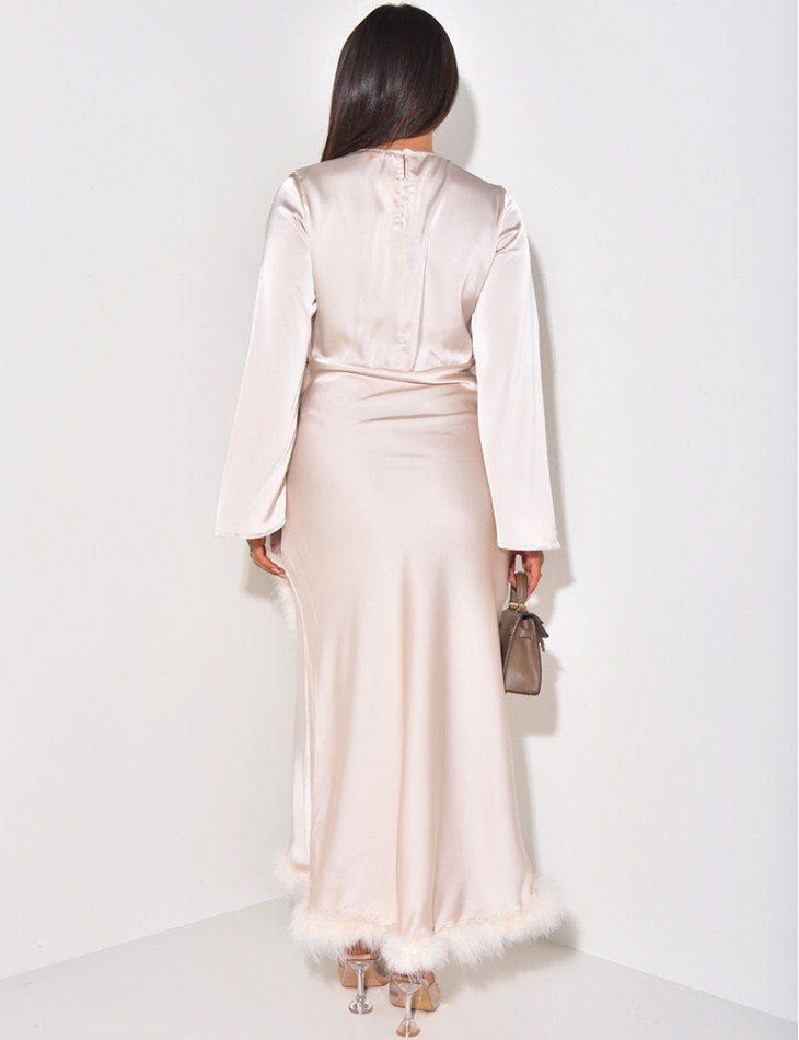 Long satin dress with feathered trims