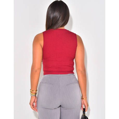 Sleeveless button-down top