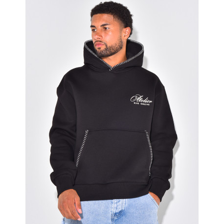 Kapuzenpullover „atelier RIVE GAUGE“