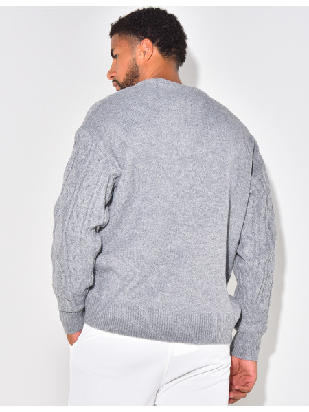 Pull gris torsadé