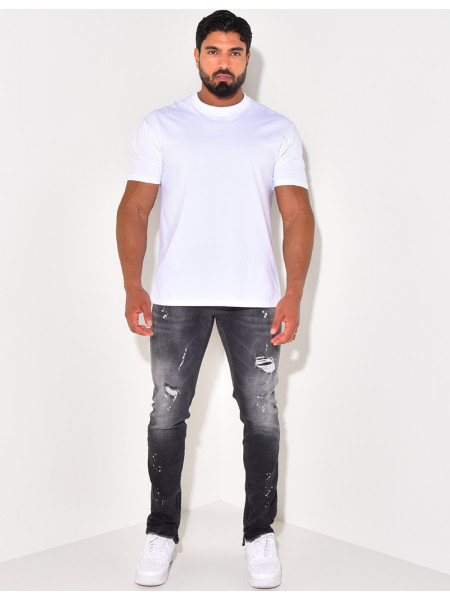 Jeans destroy à zip aux chevilles