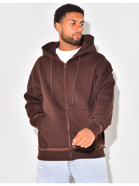 Jacket with ripped seams