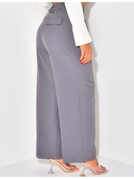 Tailored trousers with pleats