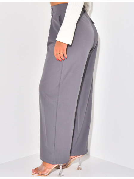 Tailored trousers with pleats