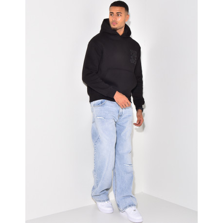 Sweat à capuche écriture en relief