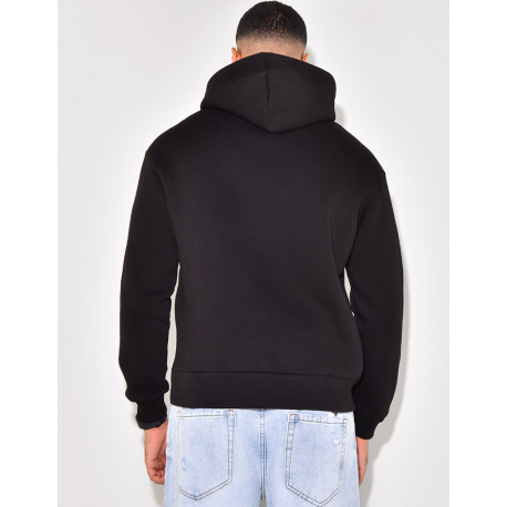 Sweat à capuche écriture en relief