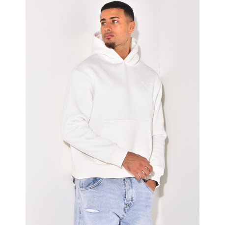 Sweat à capuche écriture en relief