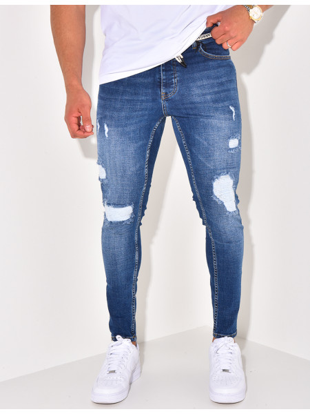 Jeans destroy à ceinture ficelle "Karomade"