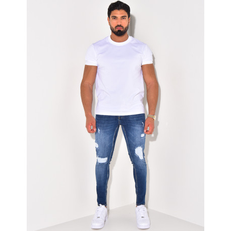 Jeans destroy à ceinture ficelle "Karomade"