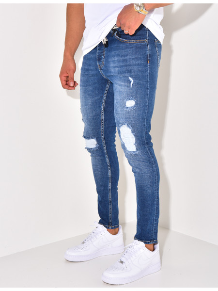 Jeans destroy à ceinture ficelle "Karomade"