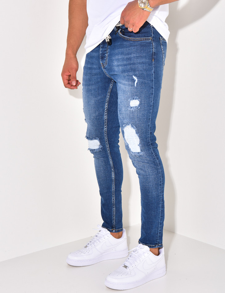 Jeans destroy à ceinture ficelle "Karomade"
