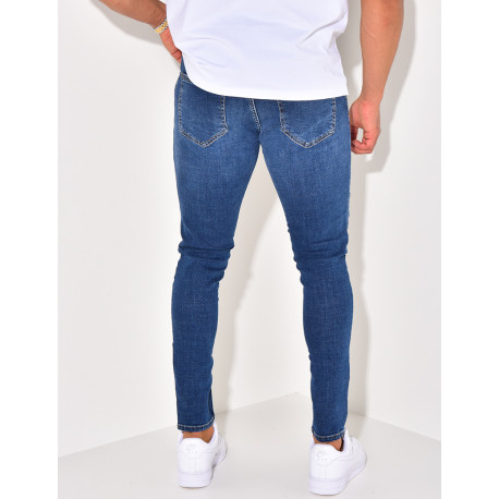 Jeans destroy à ceinture ficelle "Karomade"