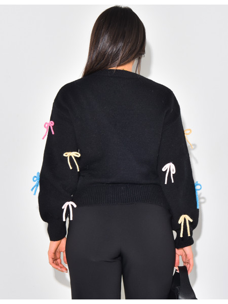 Oversized jumper with multicoloured bows
