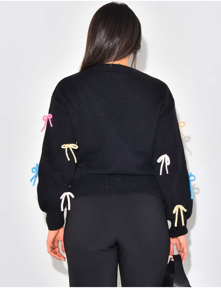 Oversized jumper with multicoloured bows