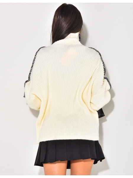 Pull en maille à surpiqûres contrastantes