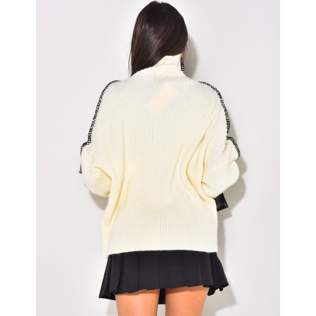 Pull en maille à surpiqûres contrastantes