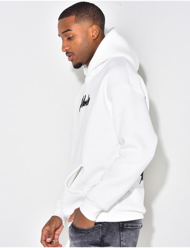 Sweat à capuche avec dessin dans le dos