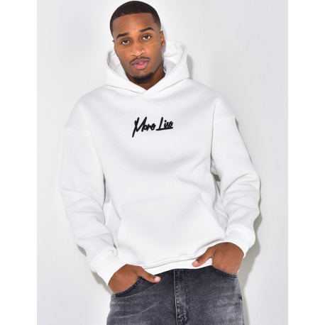 Sweat à capuche avec dessin dans le dos