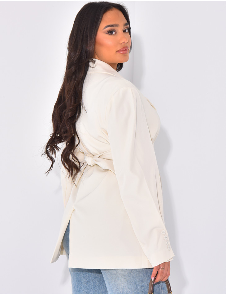 Oversized blazer with wide belt and visible buttons