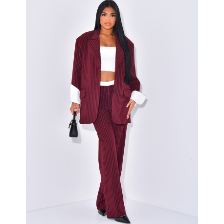 Striped tailored trousers with turn-ups at the waist