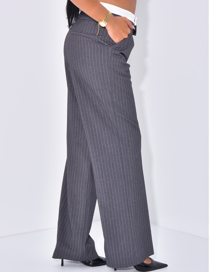 Striped tailored trousers with turn-ups at the waist