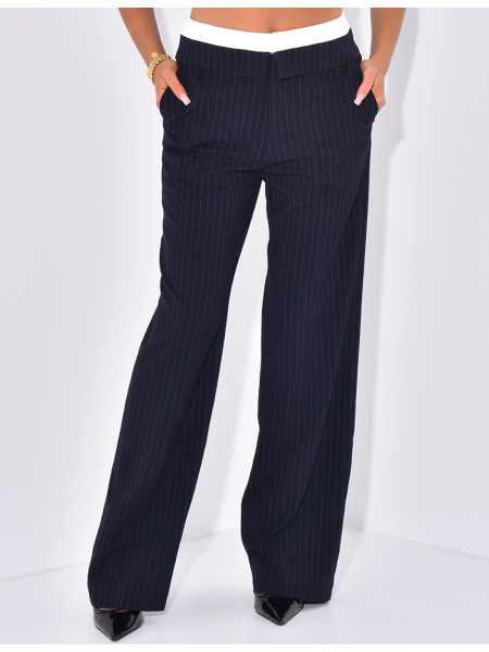 Striped tailored trousers with turn-ups at the waist