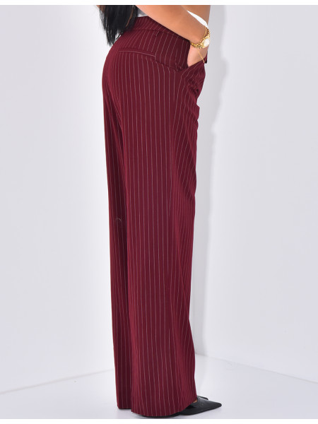 Striped tailored trousers with turn-ups at the waist
