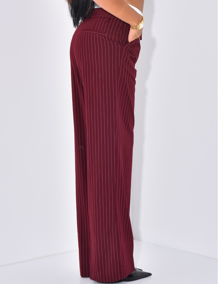 Striped tailored trousers with turn-ups at the waist