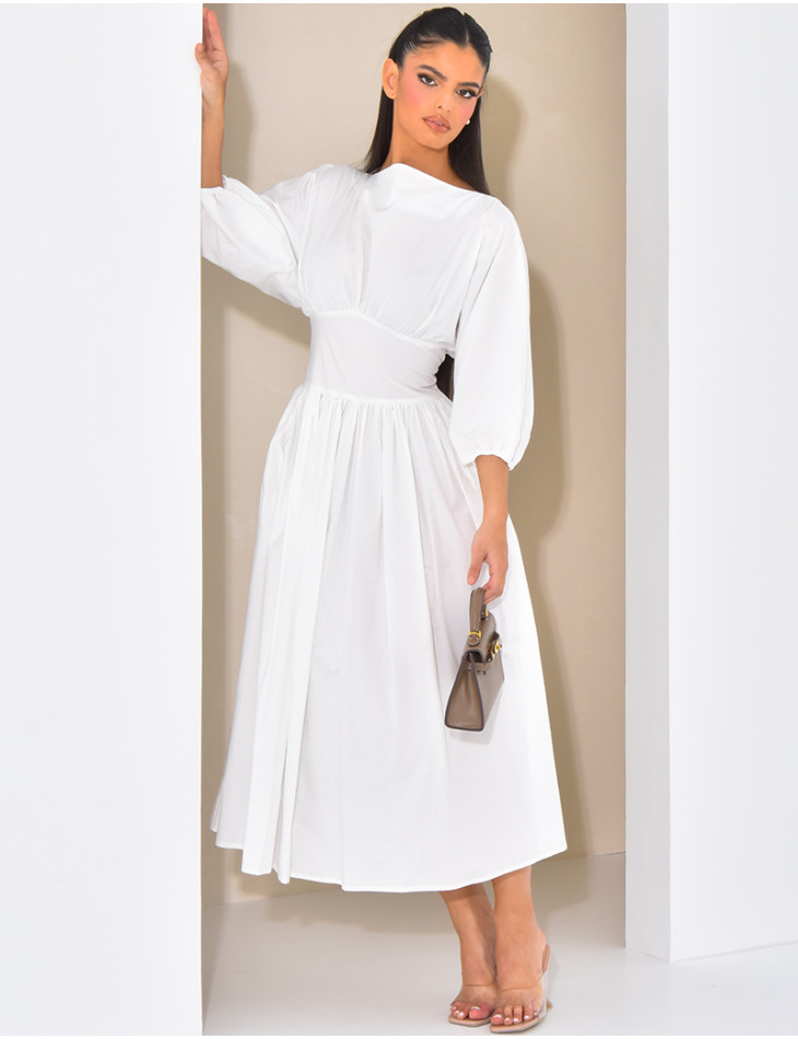 Long cotton dress fitted at the waist