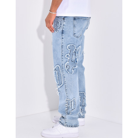 Jeans with destroy writing
