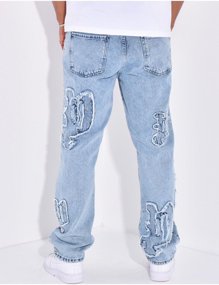 Jeans with destroy writing
