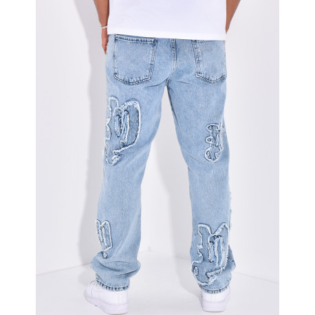 Jeans with destroy writing