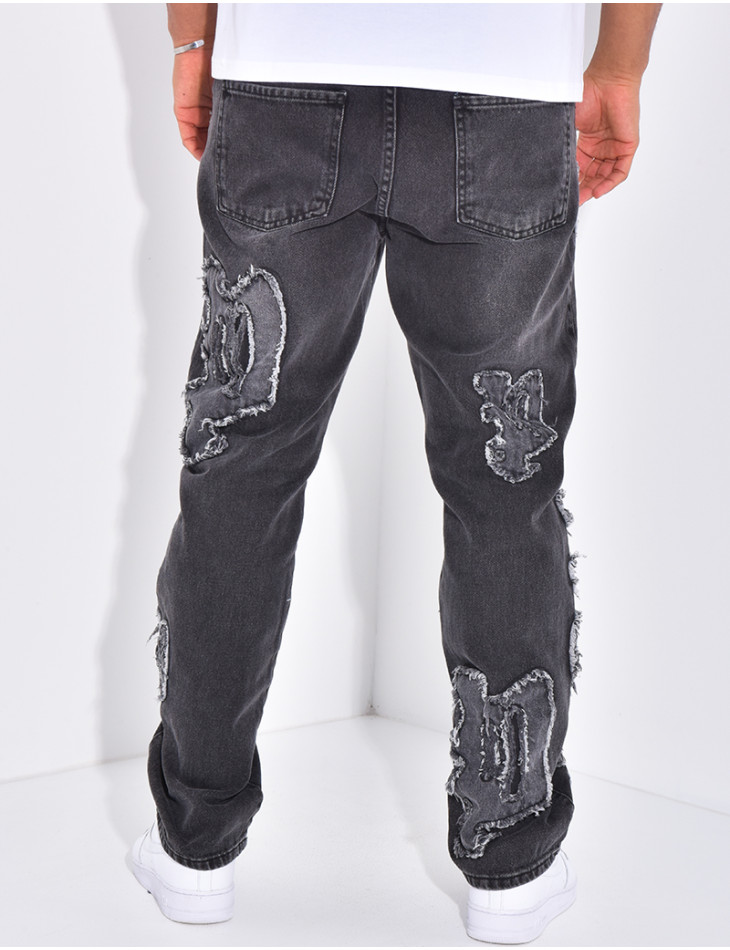 Jeans with destroy writing