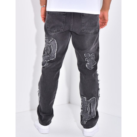 Jeans with destroy writing