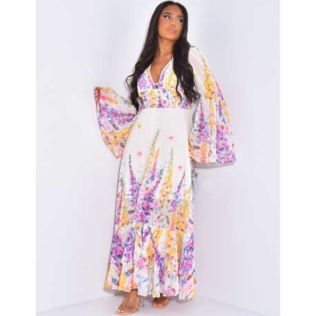 Long dress with flared sleeves and floral motif
