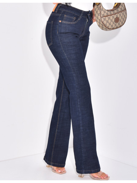 Raw blue flared jeans