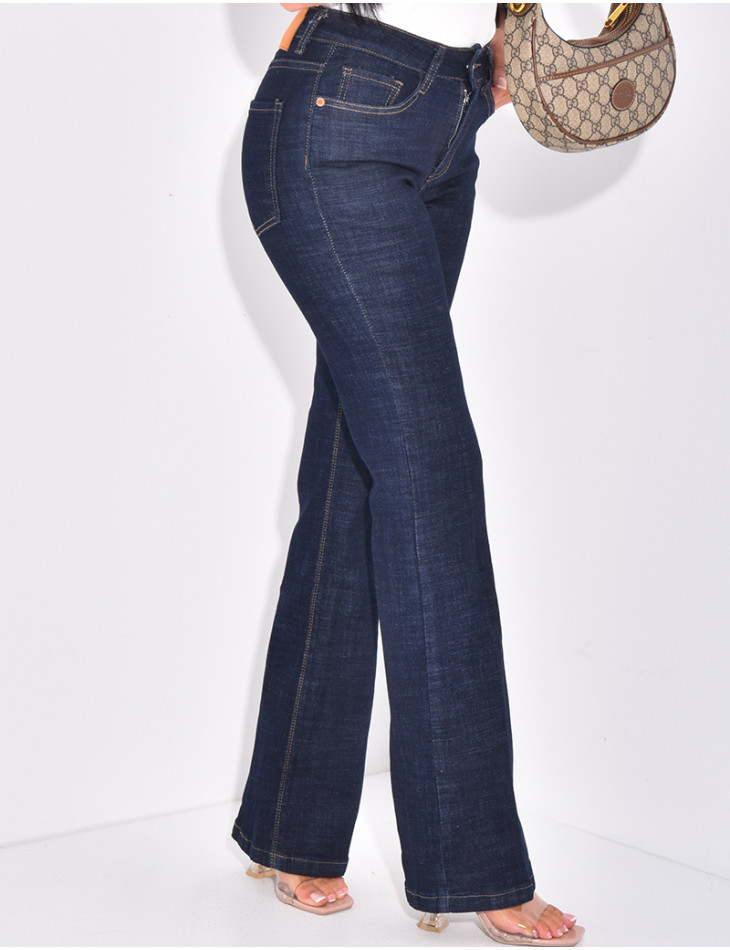 Raw blue flared jeans