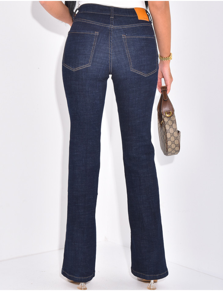 Raw blue flared jeans