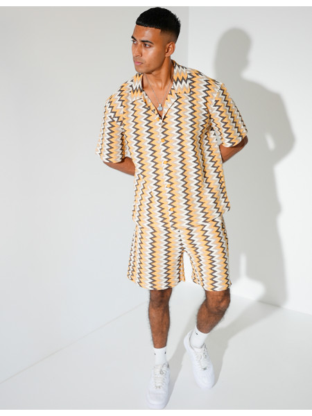 Ensemble short et chemise à motifs