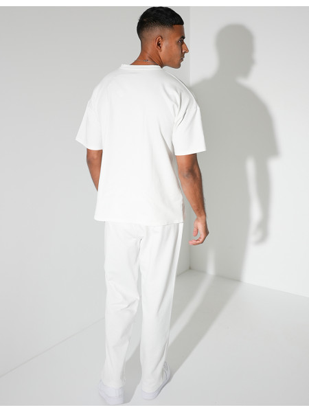 Ensemble uni pantalon à bande et t-shirt