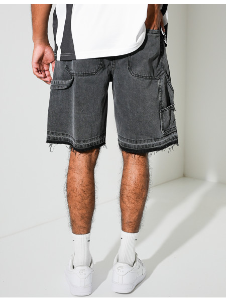 Short en jeans à empiècements contrastants & tâches de peinture