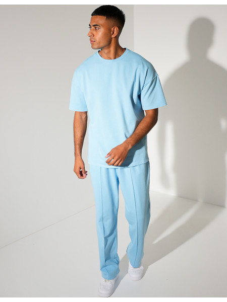 Ensemble uni pantalon à bande et t-shirt