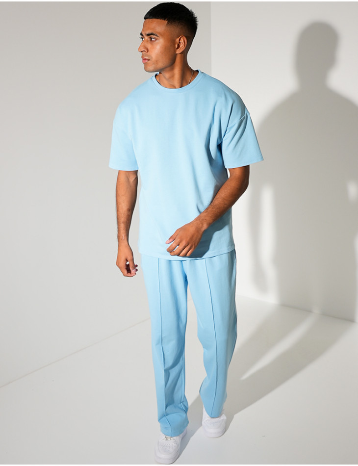 Ensemble uni pantalon à bande et t-shirt